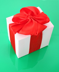 gift box close up on green background