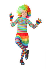 little boy in clown dress standing on one leg isolated on white