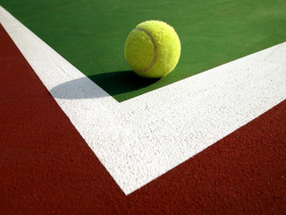 Tennis ball and tennis court