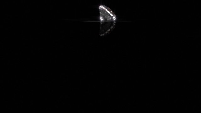 Diamond Drops onto Shiny Black Surface