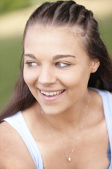 smiling girl with braided hair