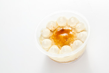 cup of whiskey cake with cream
