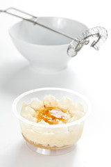 cup of whiskey cake with cream