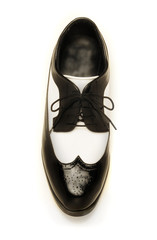 Two-tone black and white patent leather men's shoe