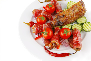 served beef rolls with chunk on white