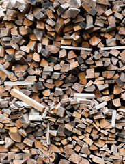 heap of firewoods  as background .