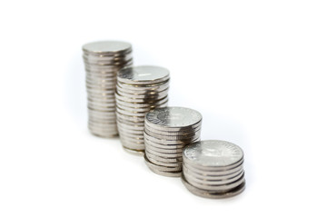 rising stack of coins with focus on the second stack