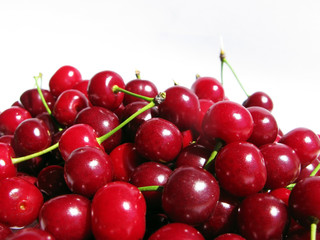 Obraz na płótnie Canvas Wonderful red cherries on white background