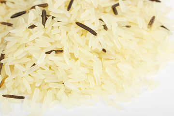 Closeup of long rice mixed with wild rice isolated on white
