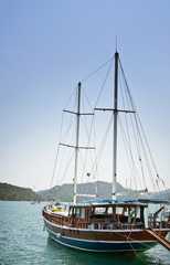 Fototapeta na wymiar Wonderful yachts in the bay. Turkey. Kekova.