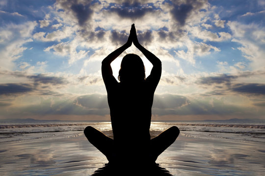 Silhouette Beach Yoga Pose. Seated Lotus.