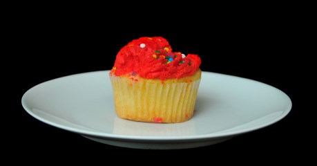 Isolated Red Cupcake on Plate