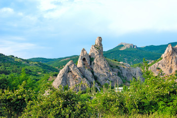 Grey mountains against the blue sky
