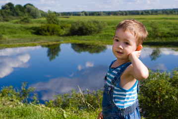 Little boy at lake
