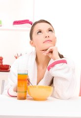 woman eating her breakfast