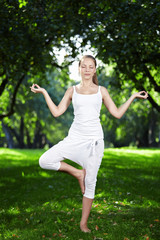 A girl in one of the yoga postures