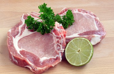 Raw pork steaks