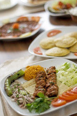 Adana Kebab, Minced Meat Kebab, Turkish Food on White Wooden Background