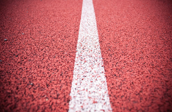 White stripe of the running track.