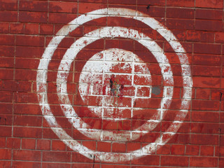 Target on the red brick wall. Urban style.