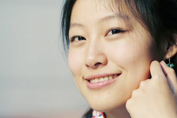 closeup of A beautiful Asian businesswoman smiling.