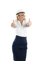 A blond girl in a sailor costume is holding thumbs up