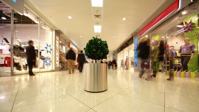 People in modern shopping centre