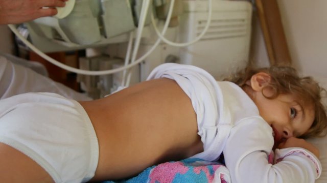 lying girl during echography medical inspection