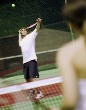 A Couple Playing Tennis