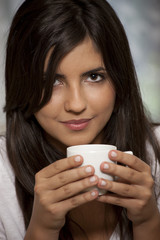 Woman with cup of coffee