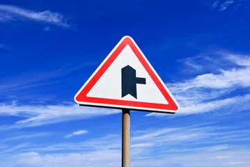 road sign on a blue sky background