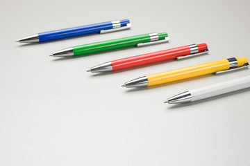 Set of colored pens on table