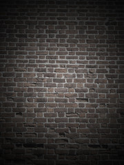 Fototapeta na wymiar Old dark brick wall background