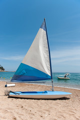 Sail boat at the beach