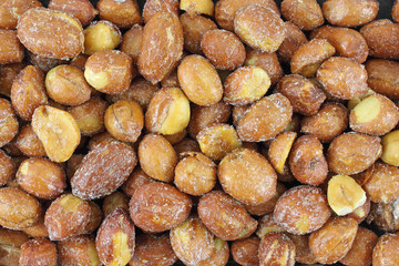 Close view of sugar and salted peanuts