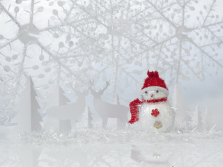 Obraz premium Snowman miniature with the cut-out paper.