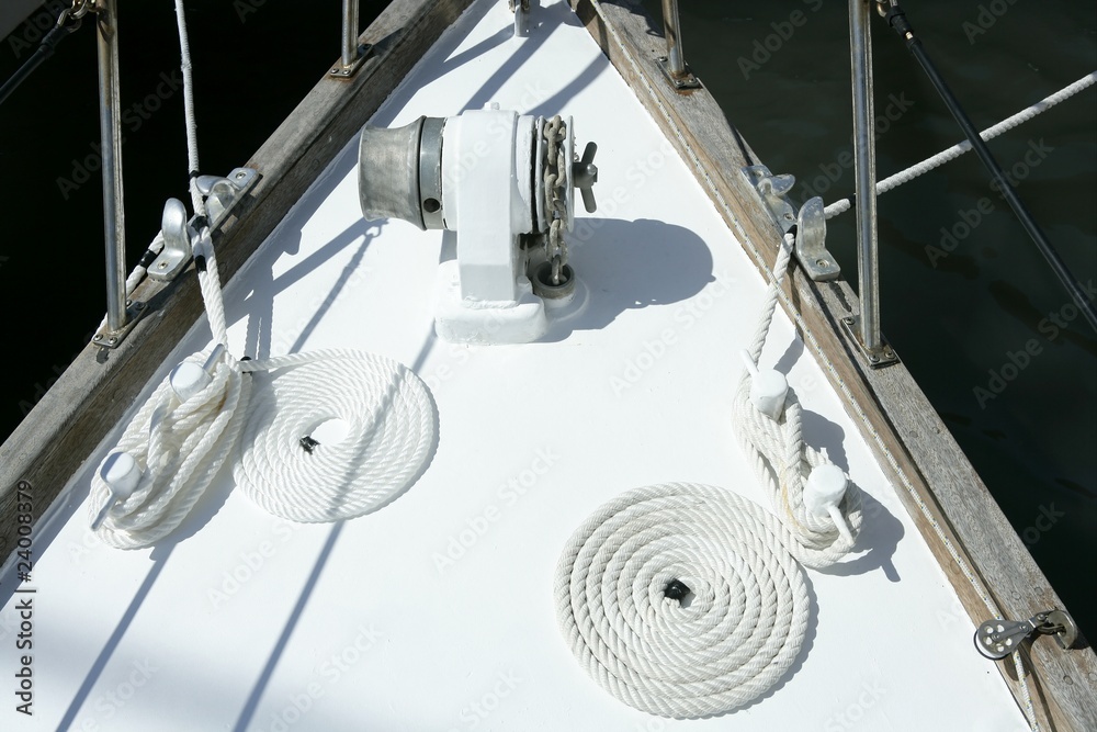 Poster sailboat white bow with bollard and spiral rope