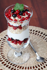 Red and black currant parfait with yogurt and oatmeal