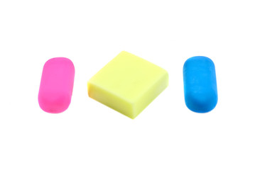 Three colored erasers
