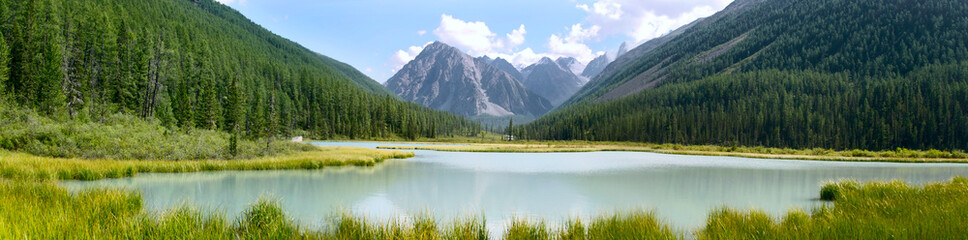 Panoramic summer view of mountains and lake in Altay, Russia
