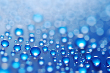 flying blue water drops