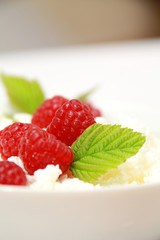 Cottage cheese and raspberry with leaf