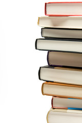 Stack of books on white background.