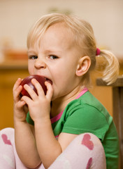 little girl with apple