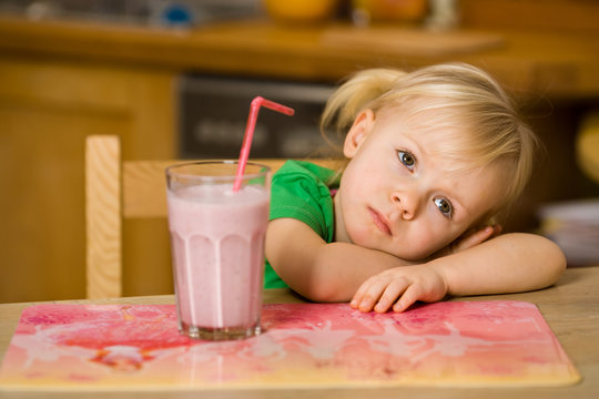 little girl with smoothie