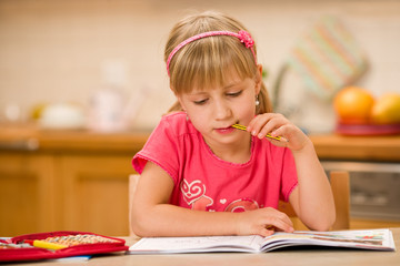 girl doing homework © mbt_studio