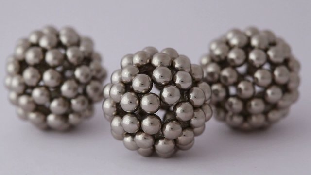 figures from metallic balls are shooted with different exposure