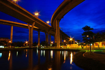 Night sceen of king rama eight 's skyline bridge in Thailand