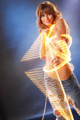 Cute blond dressed with light on blue