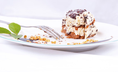 Bite sweet chocolate dessert with nuts and chocolate